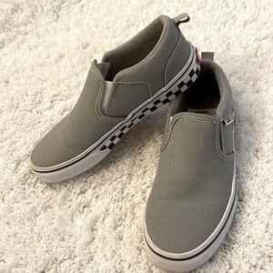 Gray girl’s Vans Slip on with checkered sole